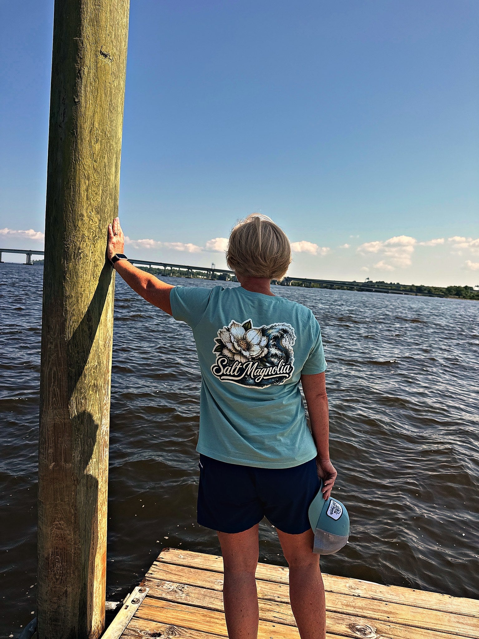 Salt Magnolia Wave Tee worn at the waterfront